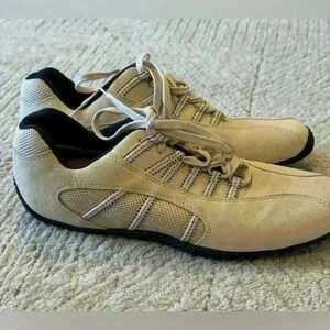 Womans ROOTS. Tennis shoe size 8.5